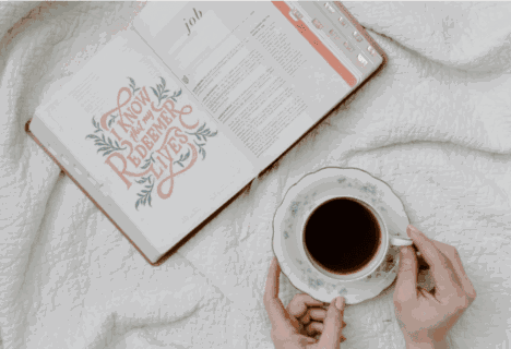 hot drink with Bible open to Job with coloring page—I know that my redeemer lives.