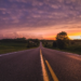 Sunrise over an empty country road