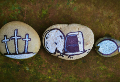 Hand painted rocks with crosses, empty tomb, and Jesus fish