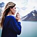 Woman praying to jumpstart faith in front of mountain