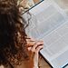Woman reading bible illustrates learning about people called by God