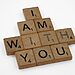 Scrabble pieces spell phrase “I am with You” in reference to God speaking with Moses. Illustrates having confidence in God for your calling.