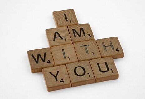 Scrabble pieces spell phrase “I am with You” in reference to God speaking with Moses. Illustrates having confidence in God for your calling.