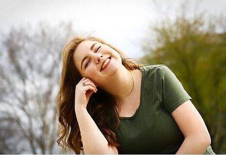 Woman smiling indicates finding contentment
