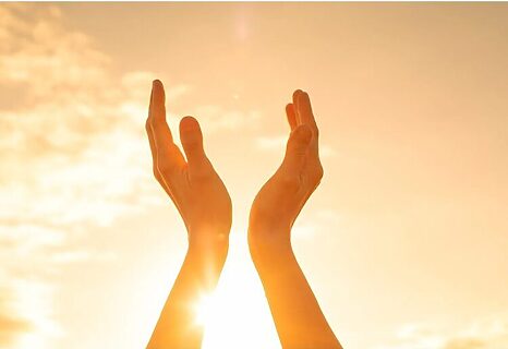 Image of raised hands illustrate praise, thankfulness and gratitude