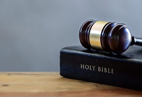 Image of gavel and Bible illustrates God punishes us