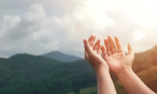 Image of outstretched hands represent why we have hope in Jesus, Easter, and resurrection