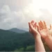 Image of outstretched hands represent why we have hope in Jesus, Easter, and resurrection