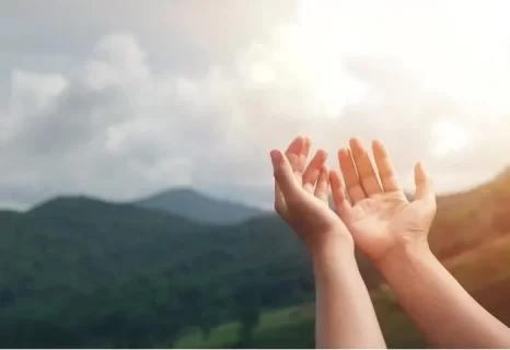 Image of outstretched hands represent why we have hope in Jesus, Easter, and resurrection