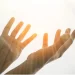 Image of uplifted hands represents faith in God’s promises and delayed blessings