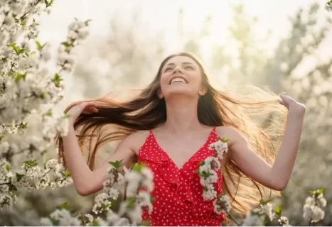 Joyful woman enjoying outdoors represents renewing your faith and refreshing your soul when feeling distant from God
